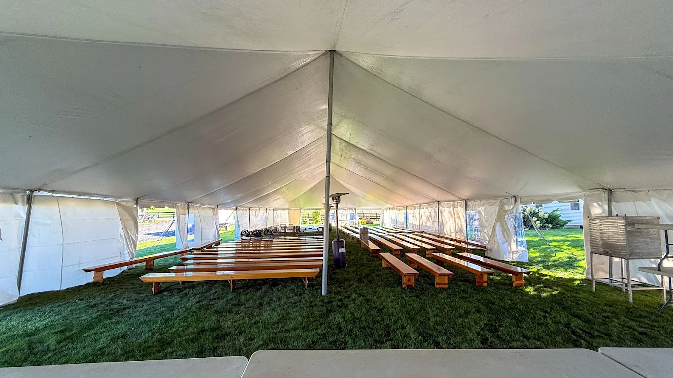 Large outdoor tent rental setup